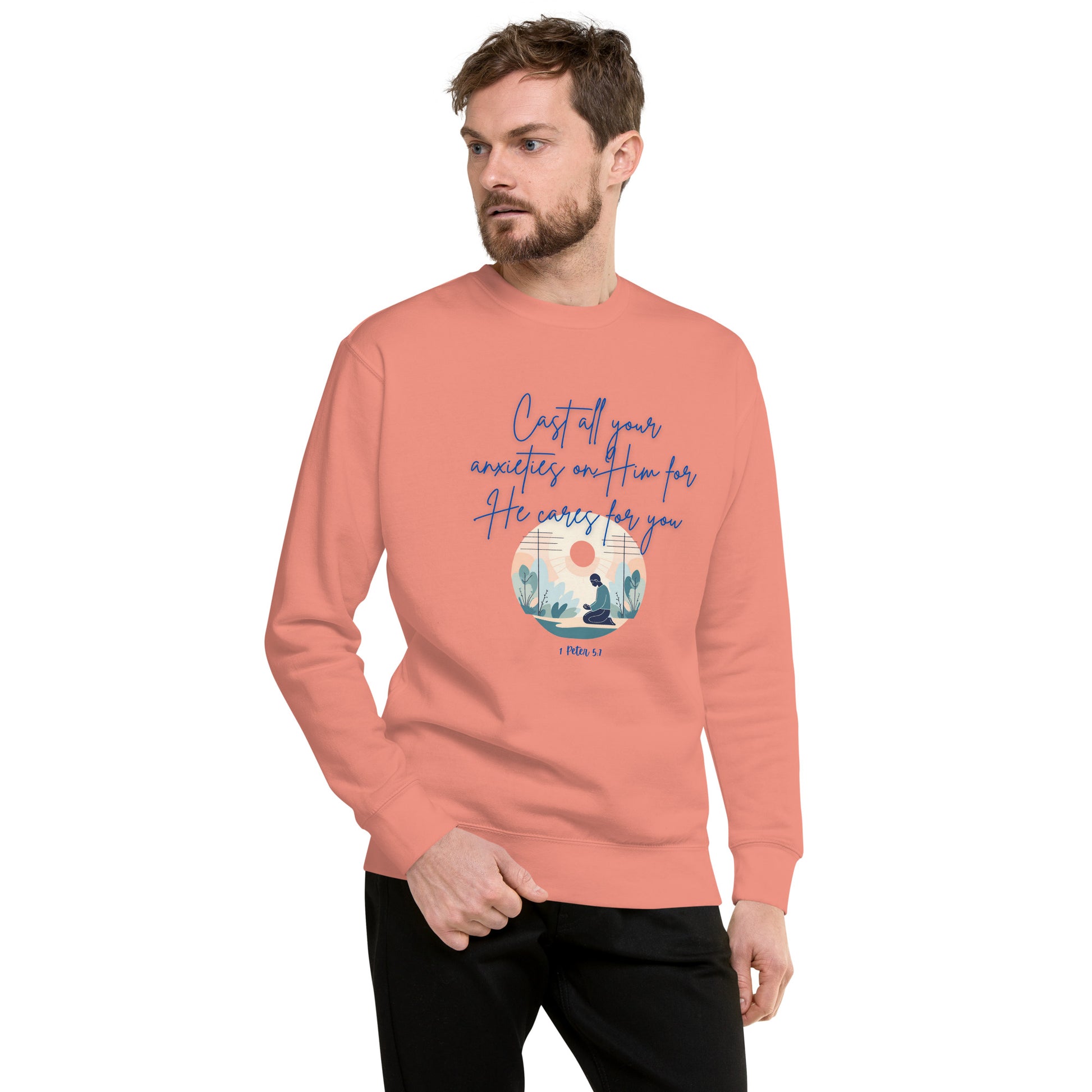 Man wearing a coral sweatshirt from Tees of Worship with he cares for you scripture design