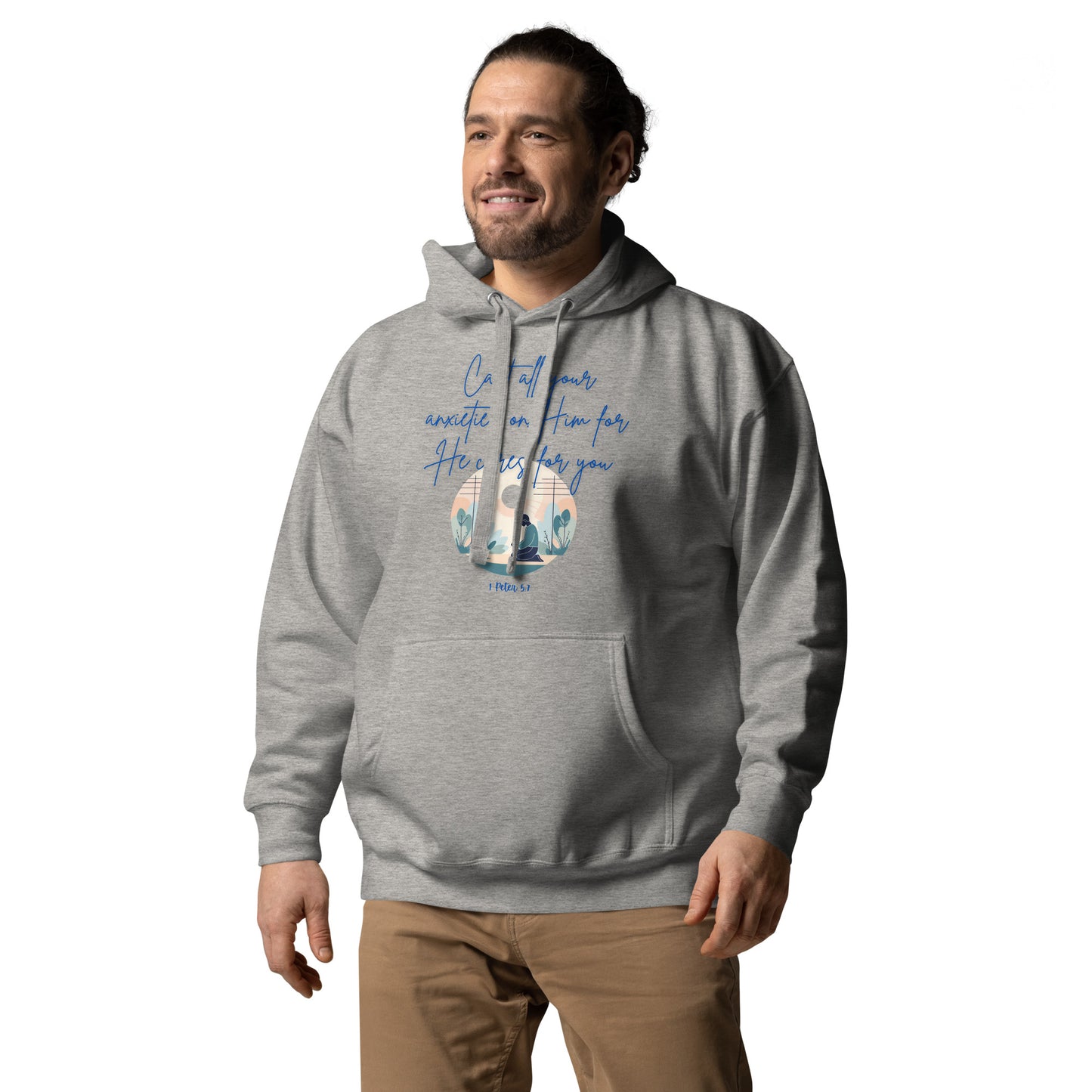 Tees of Worship gray hoodie with he cares for you scripture design worn by a smiling man