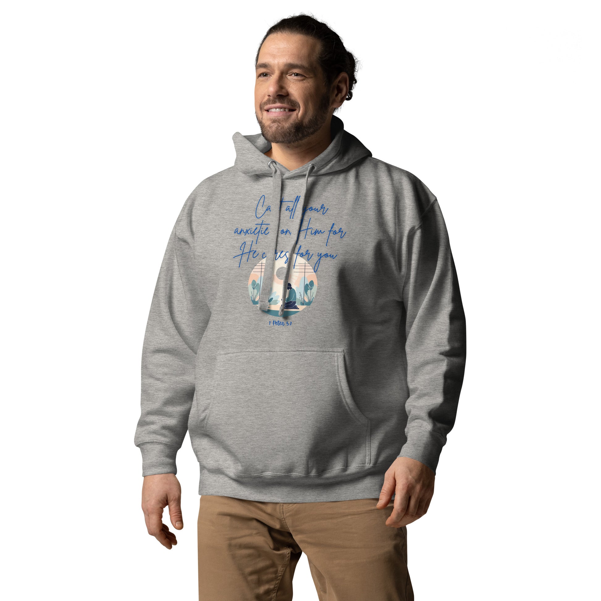 Tees of Worship gray hoodie with he cares for you scripture design worn by a smiling man