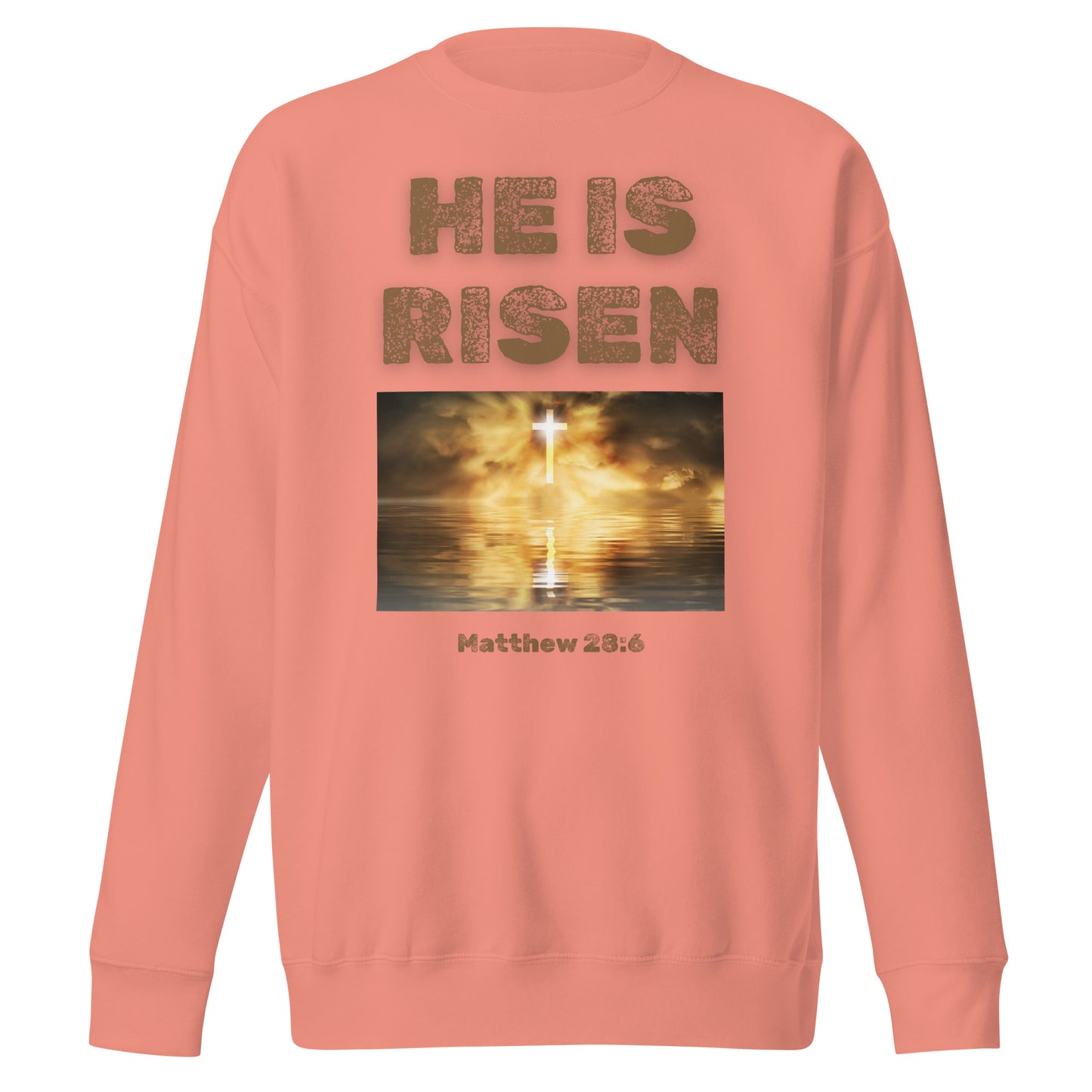 Coral sweatshirt from Tees of Worship with He Is Risen text and glowing cross design