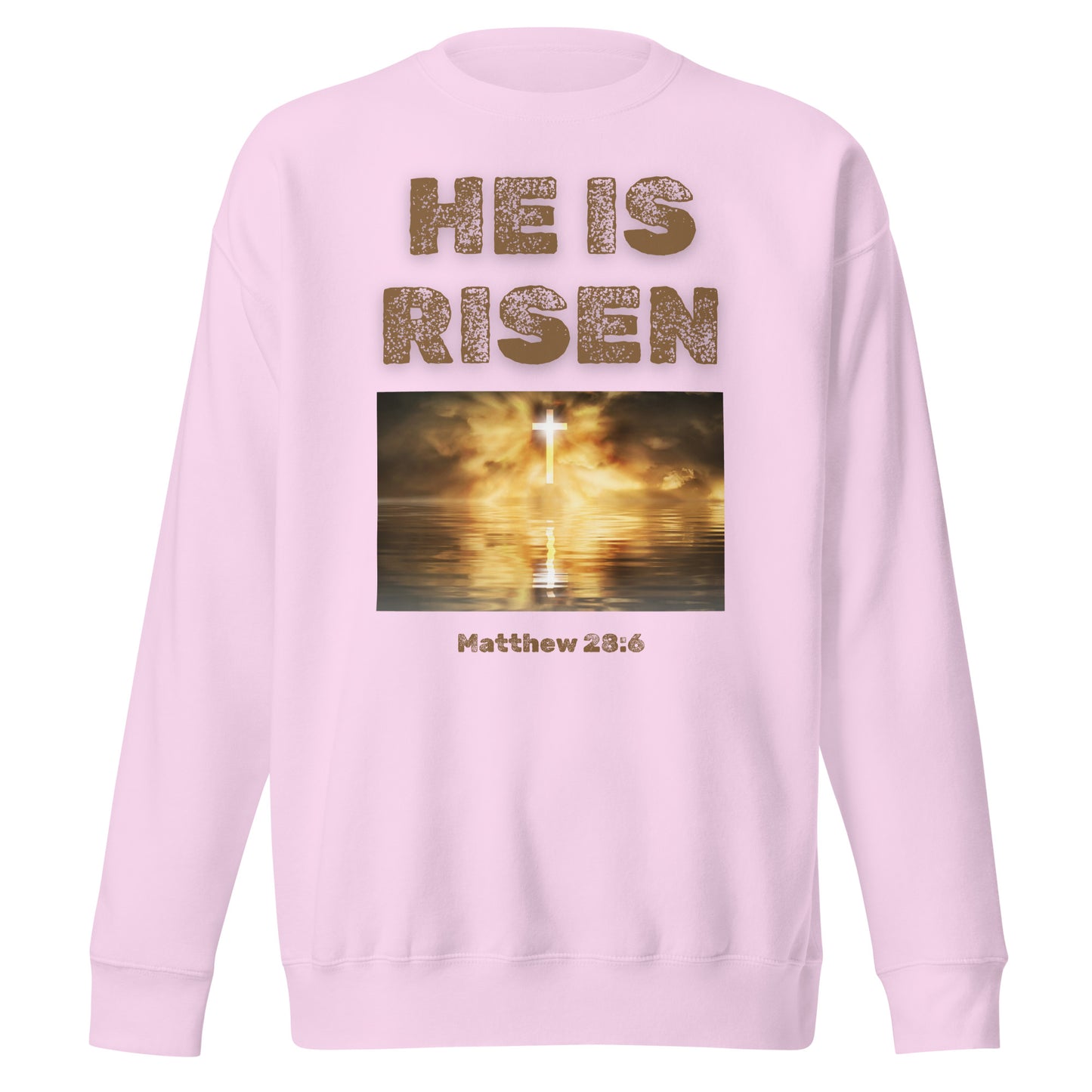 Light pink sweatshirt with He Is Risen text and glowing cross over water image by Tees of Worship