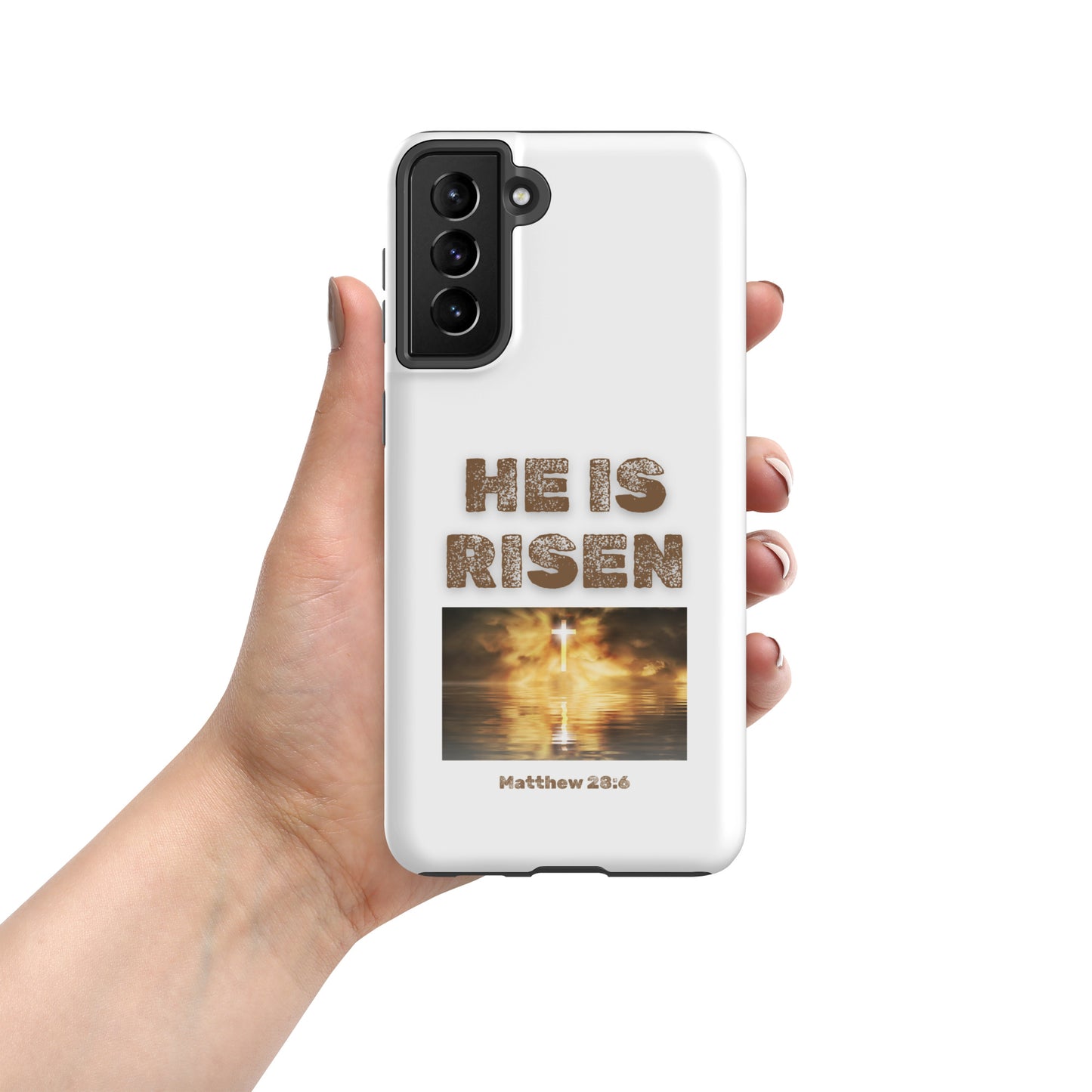 White phone case from Tees of Worship with He Is Risen text and a glowing cross image Matthew 28:6