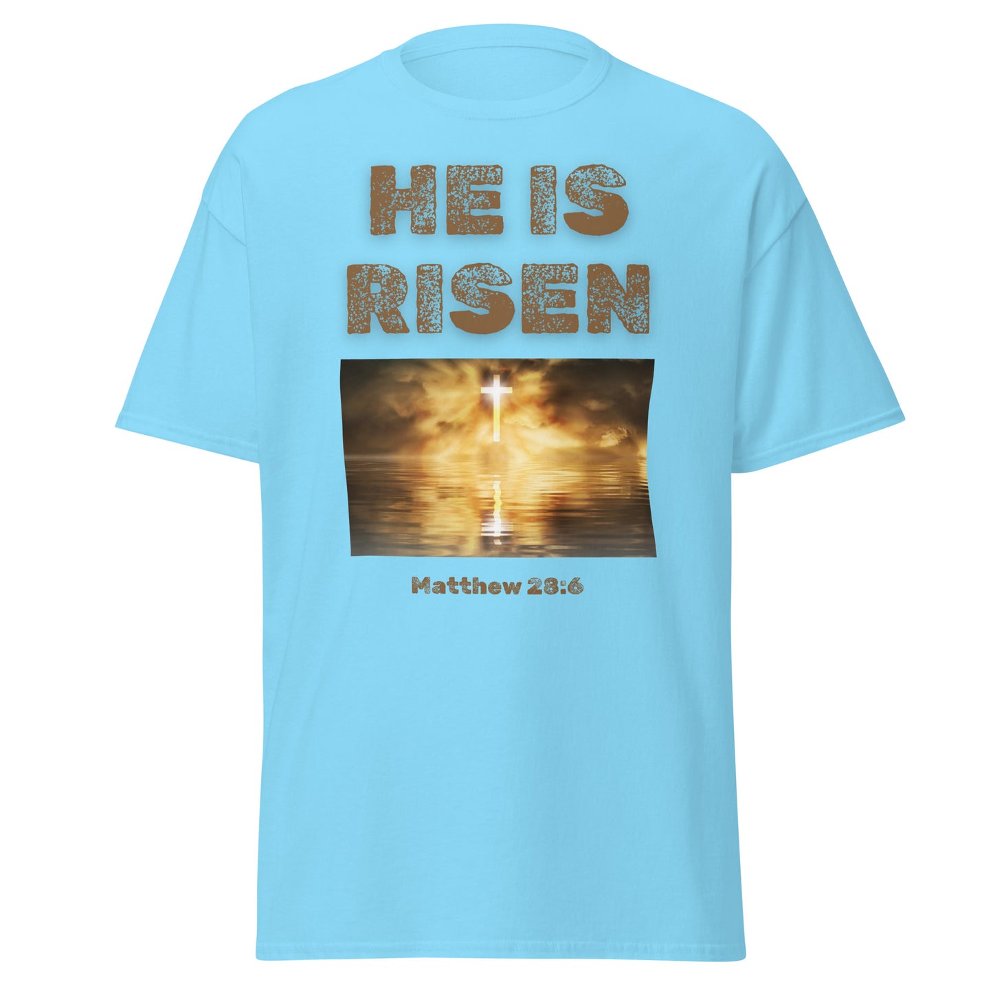 Light blue He Is Risen T-shirt by Tees of Worship with a glowing cross and Matthew 28:6 scripture