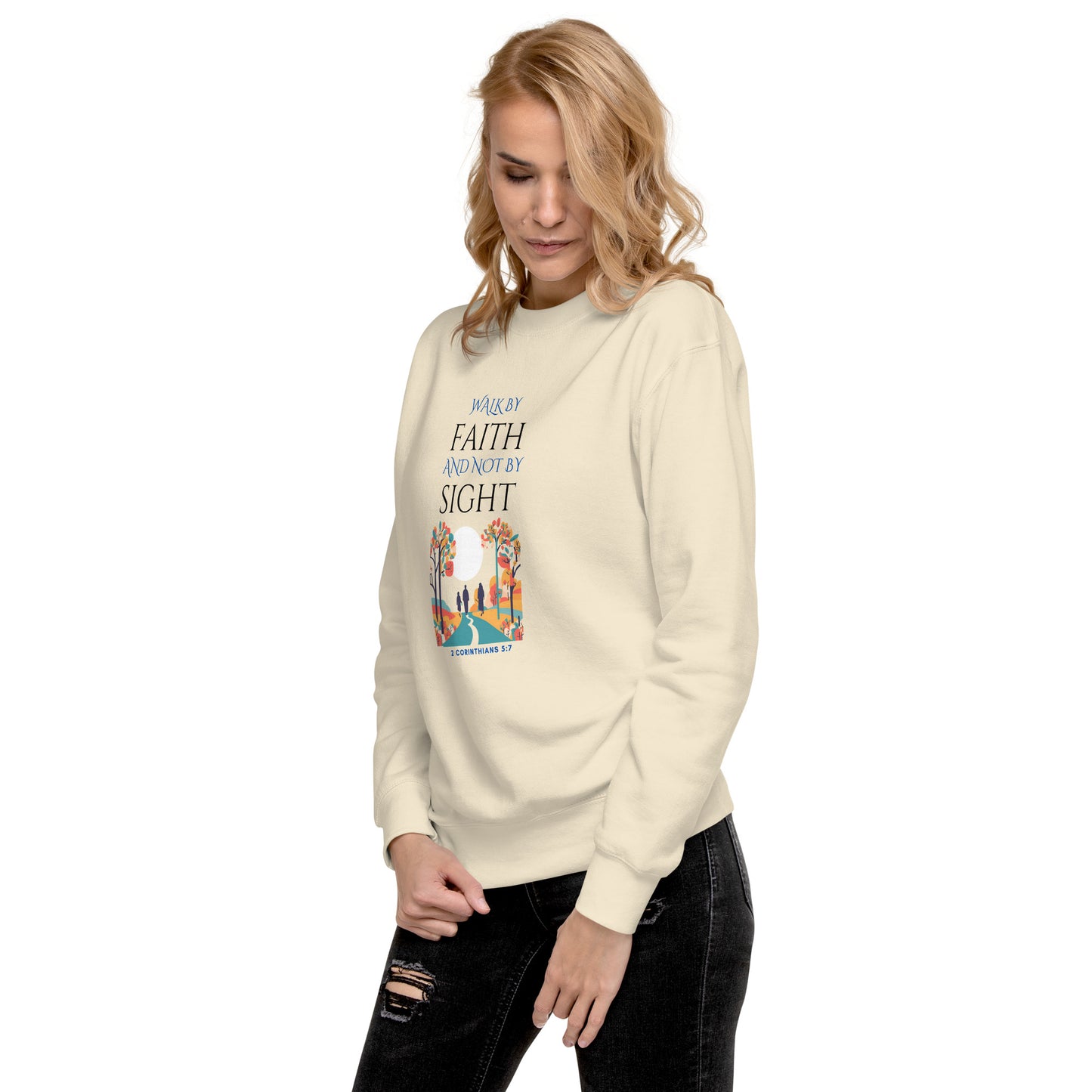 Woman wearing Tees of Worship cream sweatshirt with Walk by faith and not by sight faith-based design
